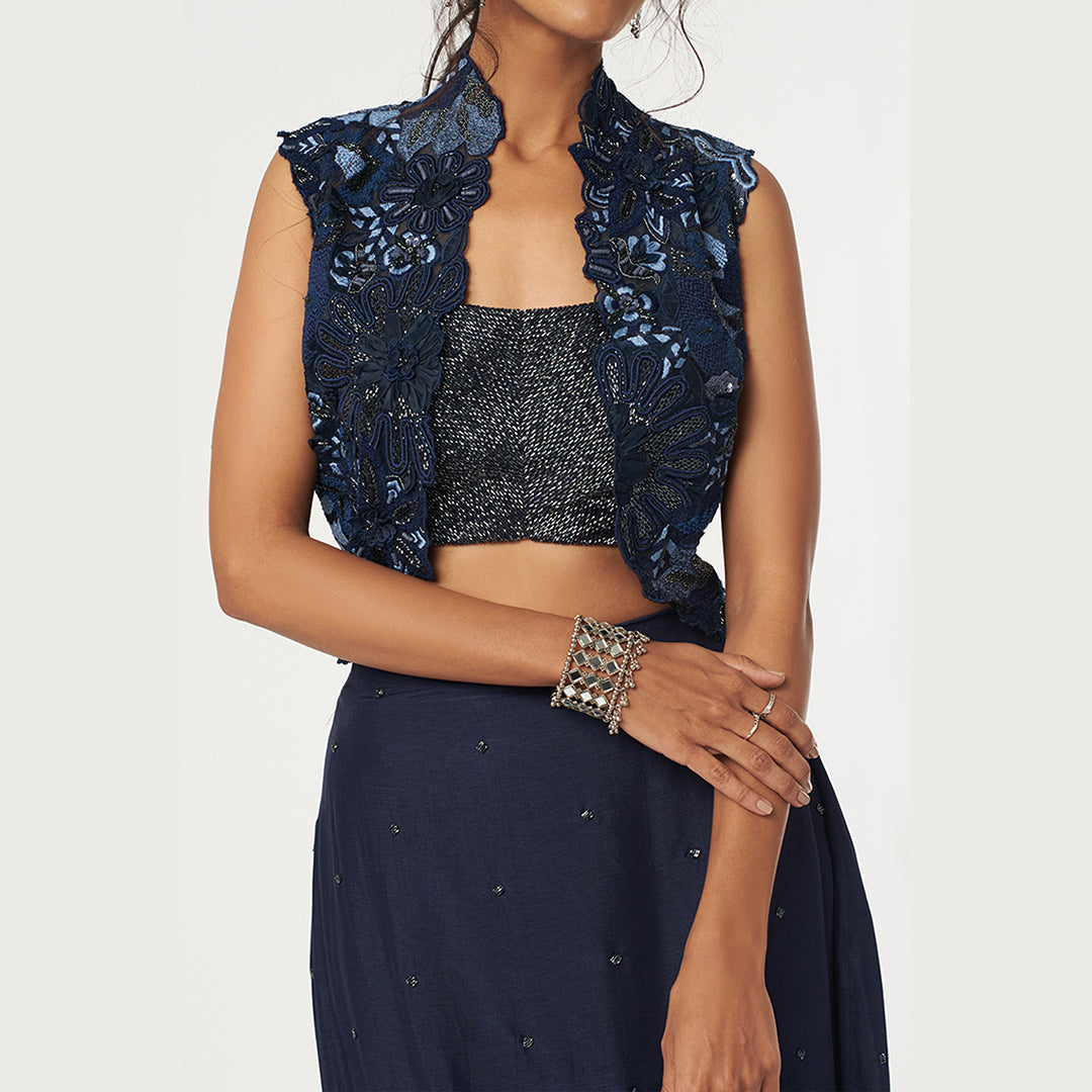 Deep blue heavy embroidered organza jacket with embroidered bustier and highlited drape skirt