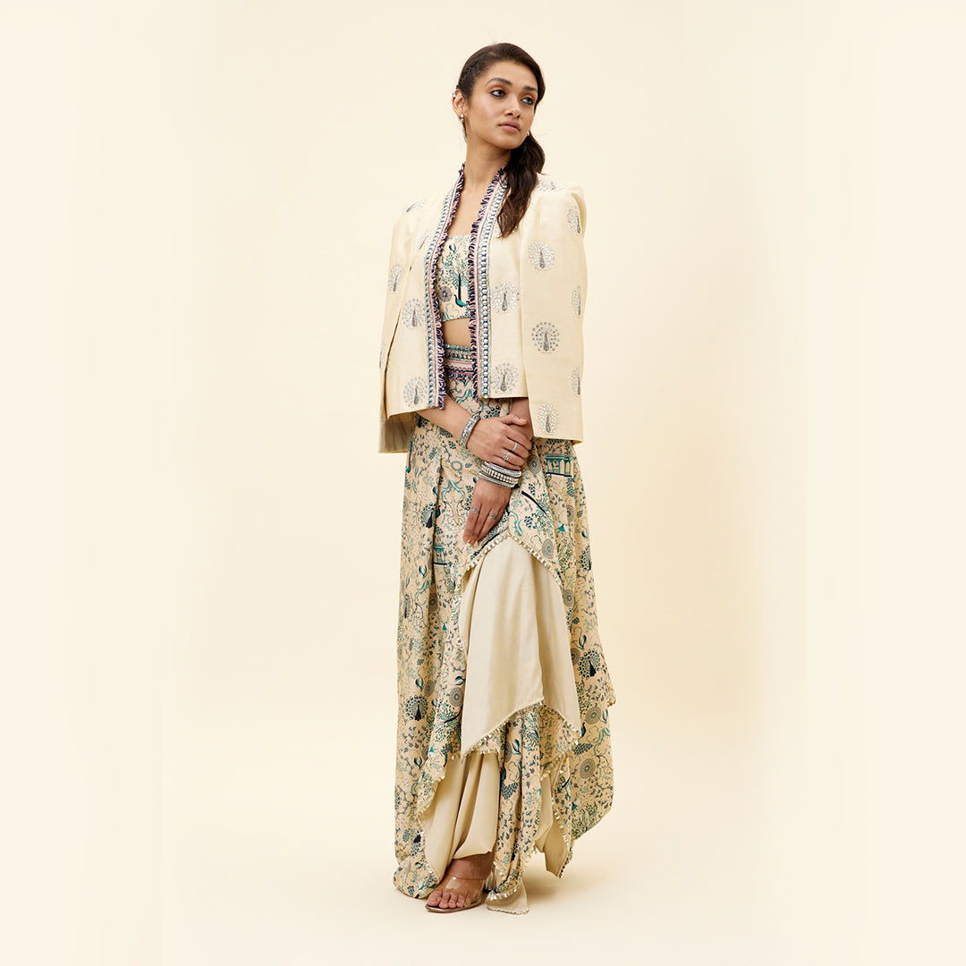 BEIGE MOR JAAL PRINT  NUSRAT DRAPED SKIRT AND BUSTIER TEAMED WITH A SIGNATURE  STRUCTURED CAPE JACKET