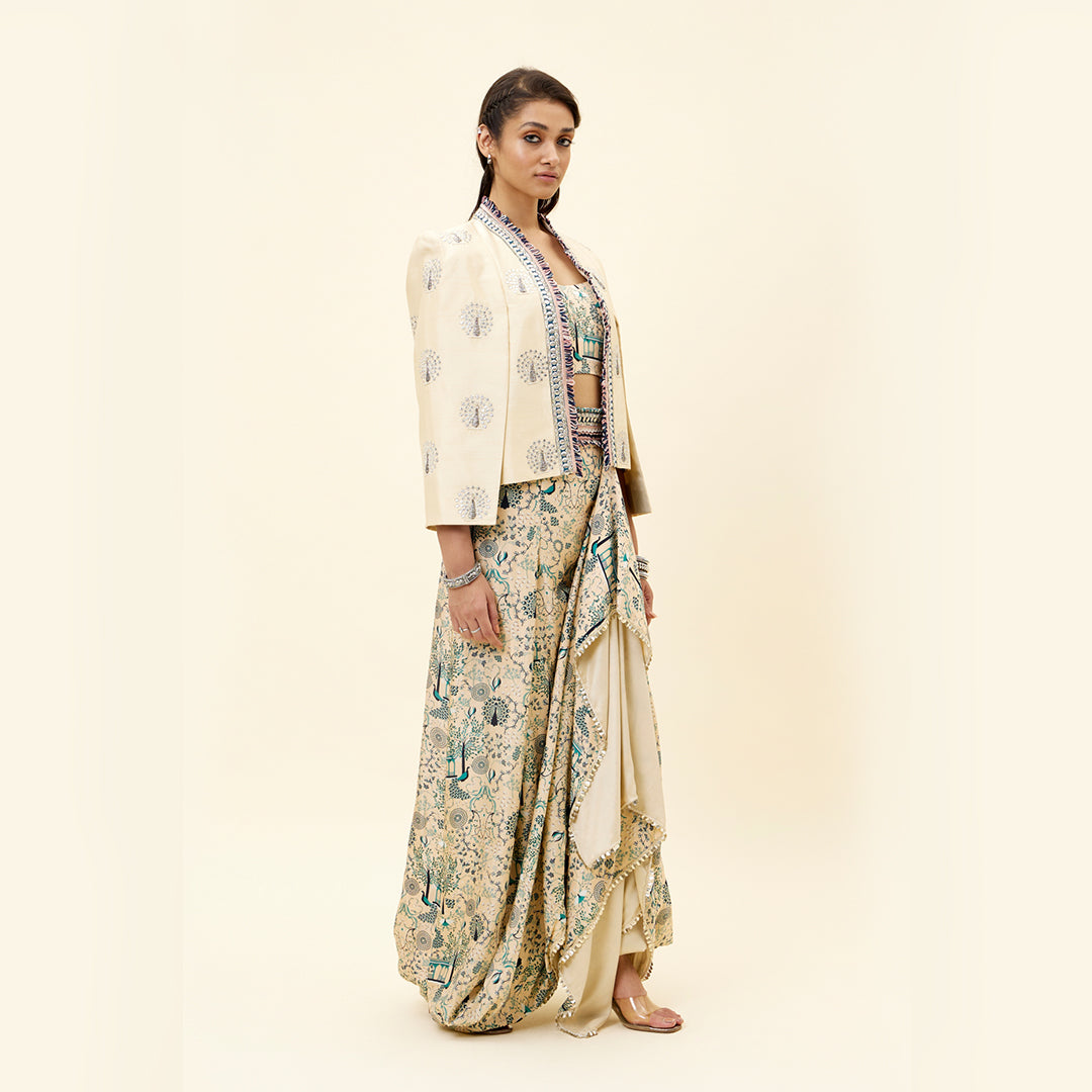 BEIGE MOR JAAL PRINT  NUSRAT DRAPED SKIRT AND BUSTIER TEAMED WITH A SIGNATURE  STRUCTURED CAPE JACKET