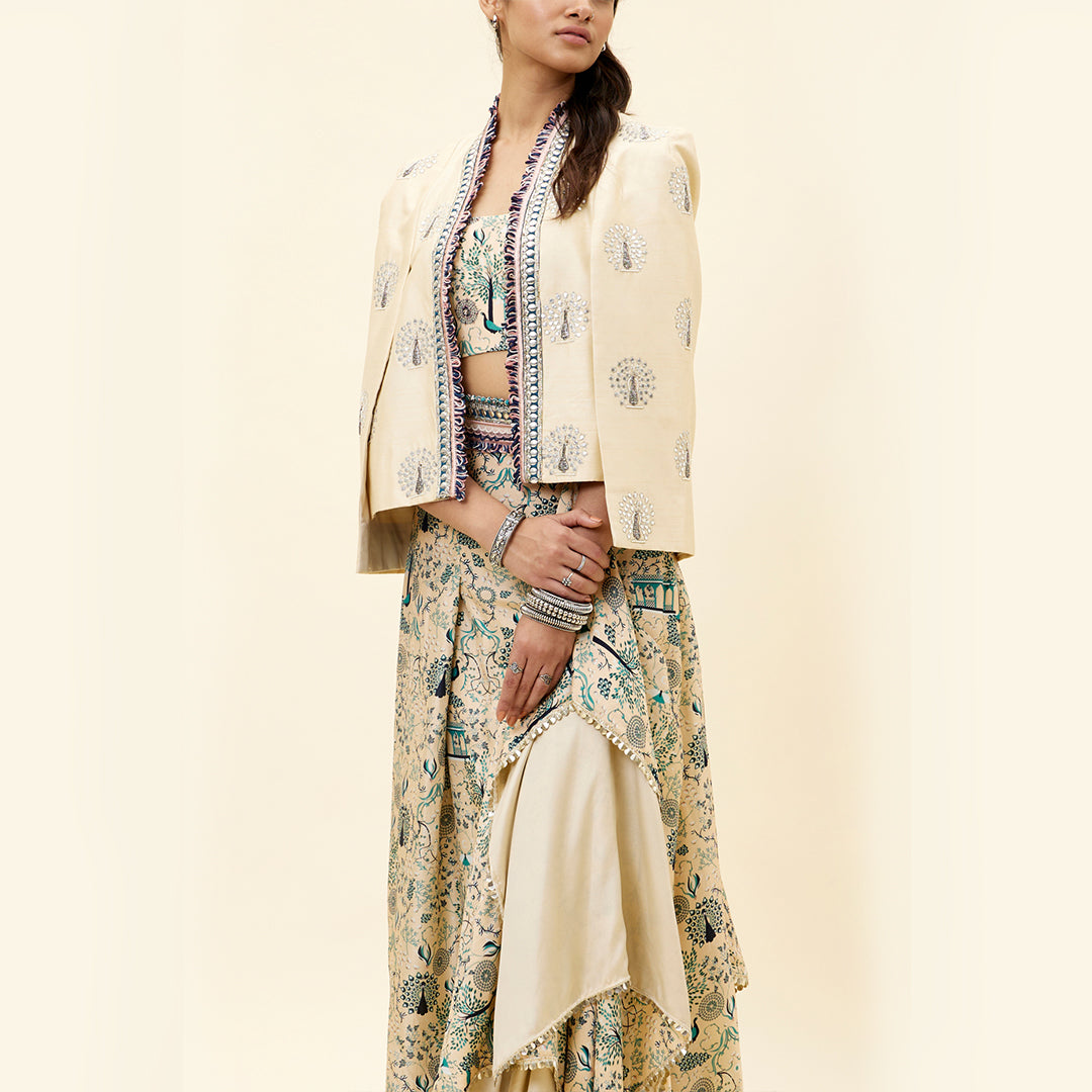 BEIGE MOR JAAL PRINT  NUSRAT DRAPED SKIRT AND BUSTIER TEAMED WITH A SIGNATURE  STRUCTURED CAPE JACKET