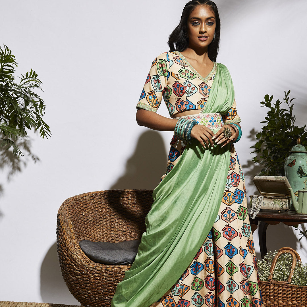 KAIRI PRINT BLOUSE WITH SLIM SHARARA PAIRED WITH GREEN DRAPE