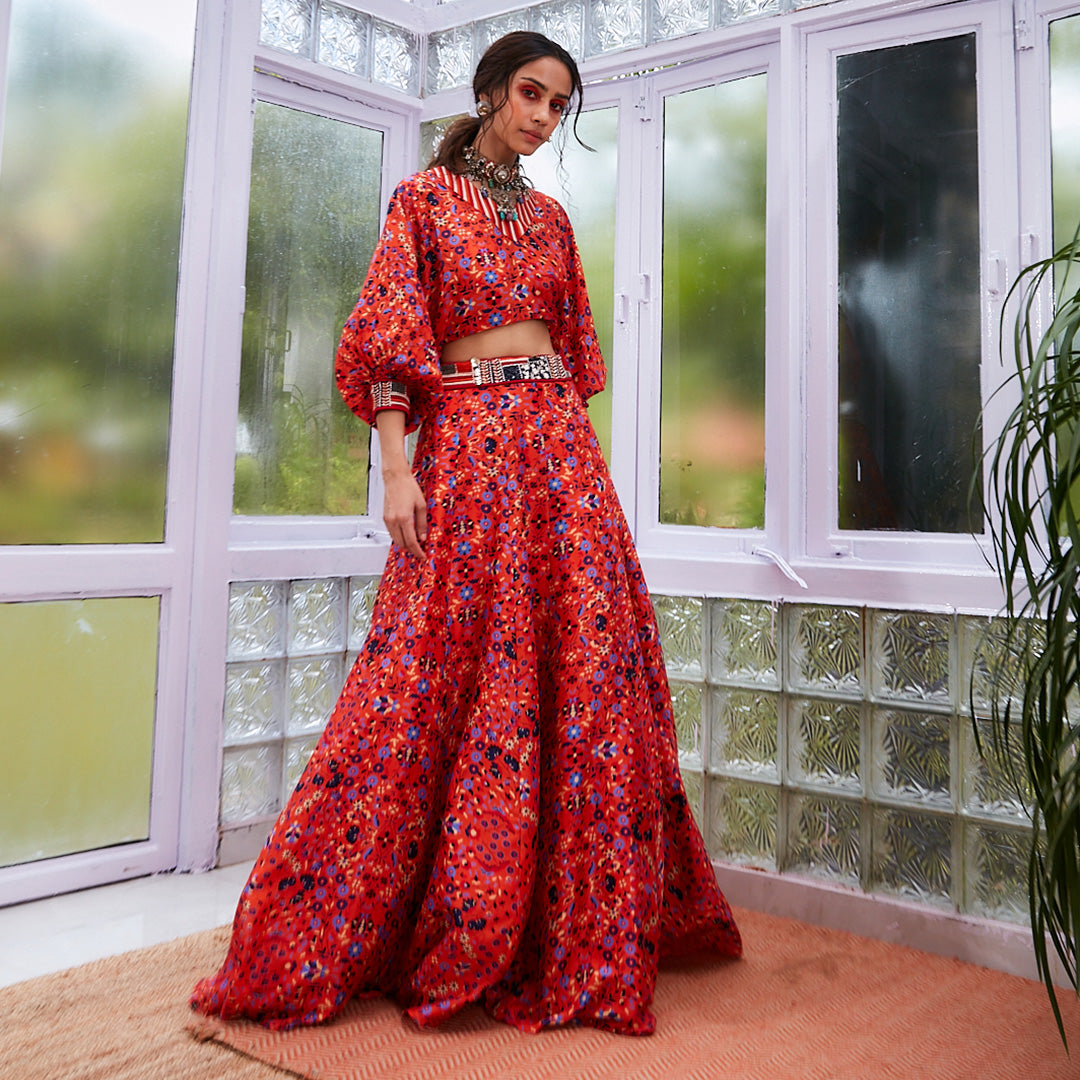 BURNT ORANGE RASA PRINT LEHENGA WITH DOLMAN SLEEVES CROP TOP