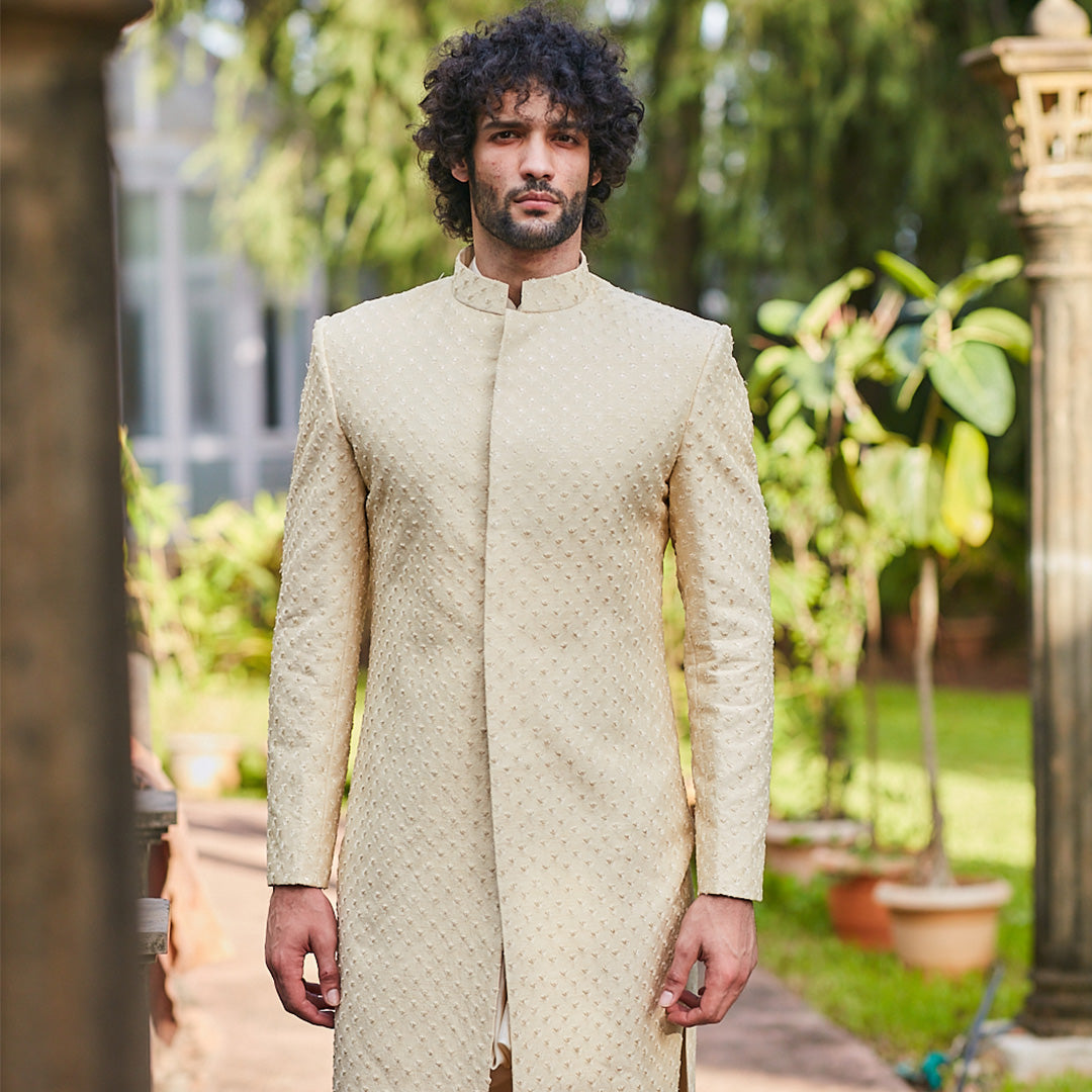 BEIGE SHERWANI WITH SELF FLOWER BUTTI AND PANTS