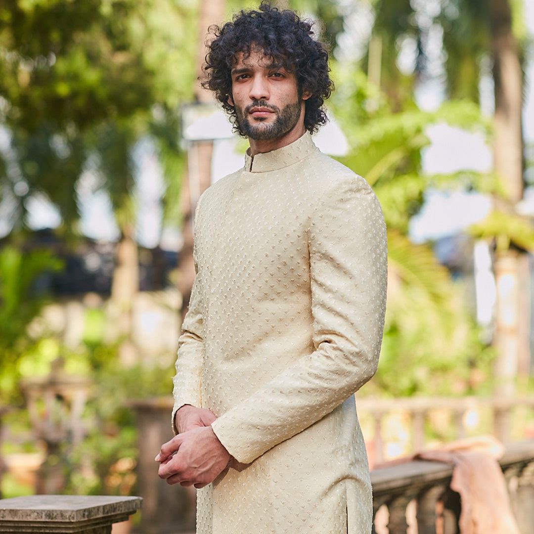 BEIGE SHERWANI WITH SELF FLOWER BUTTI AND PANTS